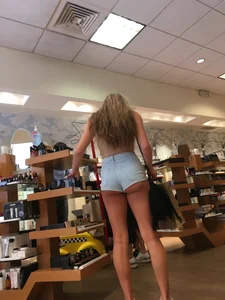 Amazing Tall Hot Girl in High-Waisted Mini Shorts with Great Ass and Legs Store Creepshots