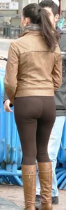Brunette babe with a nice ass in tight brown leggings