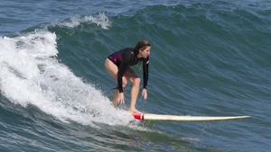 Candid surfer babes on the beach and in bikinis