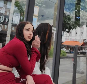 Hot minx in a stunning red outfit