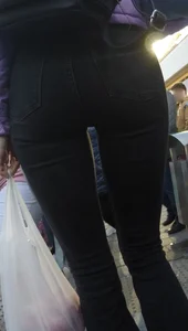Juicy ass in black tight jeans and nice skinny legs street closeups