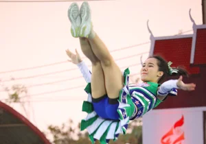 Bunch of athletic Thai cheerleaders at a competition
