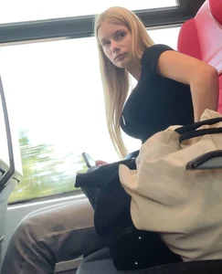 Hot busty blonde on train