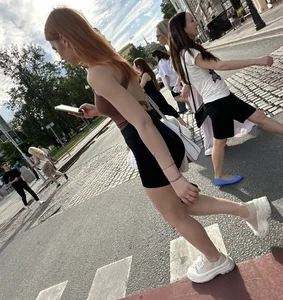 Redhead in tight shorts