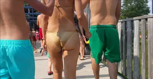 Sexy latino booty in gold bikini at Wonderland