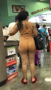 Latina with hard nipples and a big booty in tight spandex shorts outfit