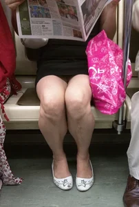 Hot Legs of a Milf Reading a Newspaper in a Subway Train - Short Dress and Her Feet in White Flats Creepshot