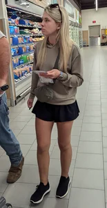 Cute petite wife with nice legs at the market (face)