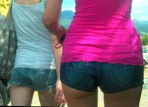 Skinny babe in denim shorts with a nice gap showing ass cheeks