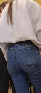 Girl is showing her blue jeans