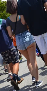 Thick booty babe in denim shorts showing her cheeks