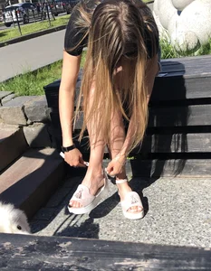 Girl in Denim Shorts with Amazing Hot Legs Fixing Her Sandals Street Candid Photo Gallery