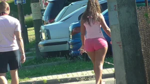 Thick booty babe walking her dogs in pink shorts