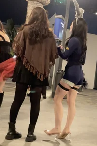 Asian baddie with great legs, heels and Cop costume
