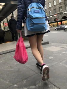 Girl With Skinny Legs in Pahtyhose and a Skirt Walking Down the Stairs Street Candid Gallery