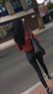 Chav brunette with a nice ass and vpl in tight black leather pants