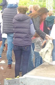 Milfs' butts in jeans on the streets