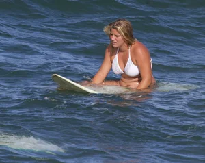Candid surfer babes on the beach and in bikinis