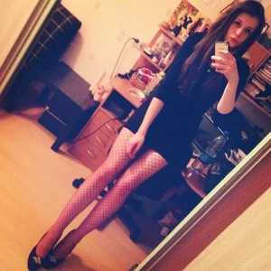 Cute Selfie of Skinny Girl in Fishnet Pantyhose, Long Skinny Legs