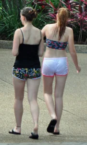 Couple of cute girls in wet shorts with decent asses