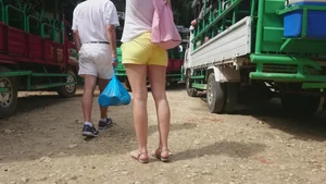 Milf in yellow shorts with vpl and a wedgie