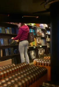 Candid teen in sweatpants at the bookstore