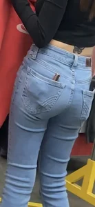 Petite Asian ho showing off tramp stamp & bubble butt