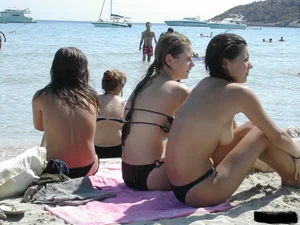Beach voyeur girls in bikinis, thongs and topless