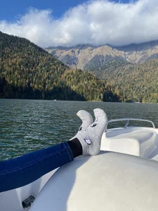 Skinny Teen Legs in Jeans And Feet - Taking Off Sneakers And Showing Socks