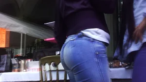 Big booty Latina lady in tight jeans with a round ass