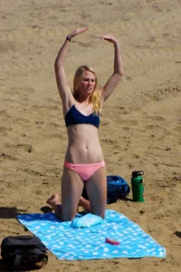 Sexy mix of girls in bikinis at the beach