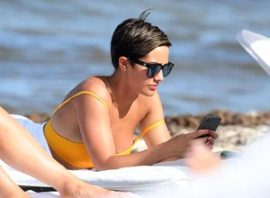 Frankie Bridge nip slips in a bikini on the beach