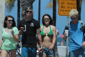 Big collection of various sexy girls on a beach in bikinis