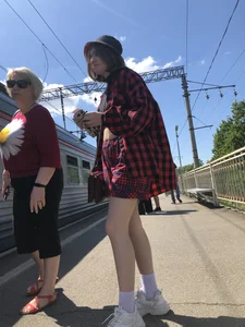 Cute candid teen on a train platform
