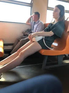 Amazing Hot Girl Sitting in the Train in Shorts Showing Off Her Gorgeous Legs Candid Gallery