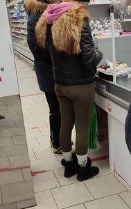Blonde milf with a big hot butt in green leggings at the supermarket creepshots