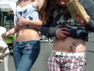 Girls Flash Tummies on the Street Candid Photo
