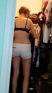 Candid wife in shorts and a bra in a wardrobe home creepshot