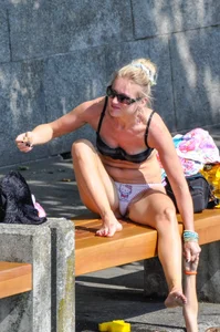 Blonde milf looking sexy in Hello Kitty bikini with nice mound and camel toe
