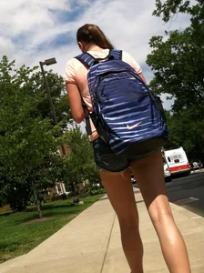 Hot college girl in little jean shorts showing some cheeks and legs