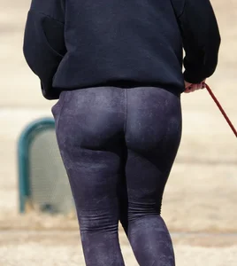 Ass in Purple Leggings