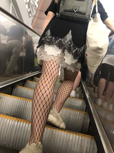 Cute Girl in Lacey Semi-Transparent Dress and Fishnet Pantyhose Subway Escalator Candid Photos Gallery