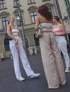 Long blonde braless in a white outfit (many pictures)