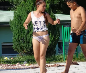 Sexy big bootied Latino girl in see thru underwear thong and white top with no bra