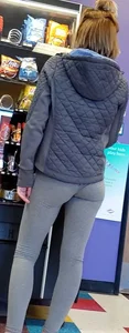 Girl with a great ass in tight grey leggings