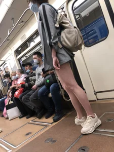 Cute Girl in Shorts and Sneakers With Hot Legs in Subway Train Creepshots Gallery