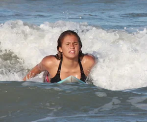 Hot surfer chicks out in the water