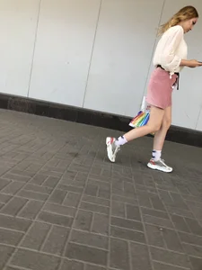 Cute street candid girl in a skirt