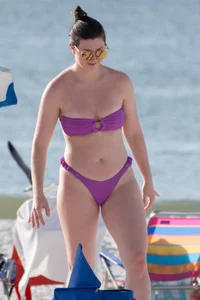 Pale chick in tiny purple thong