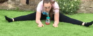 Girl Drinking Smoothie While Doing Splits Creepshots